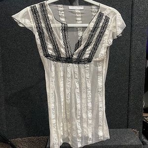 White sheer lace short sleeve shirt with black lace detail